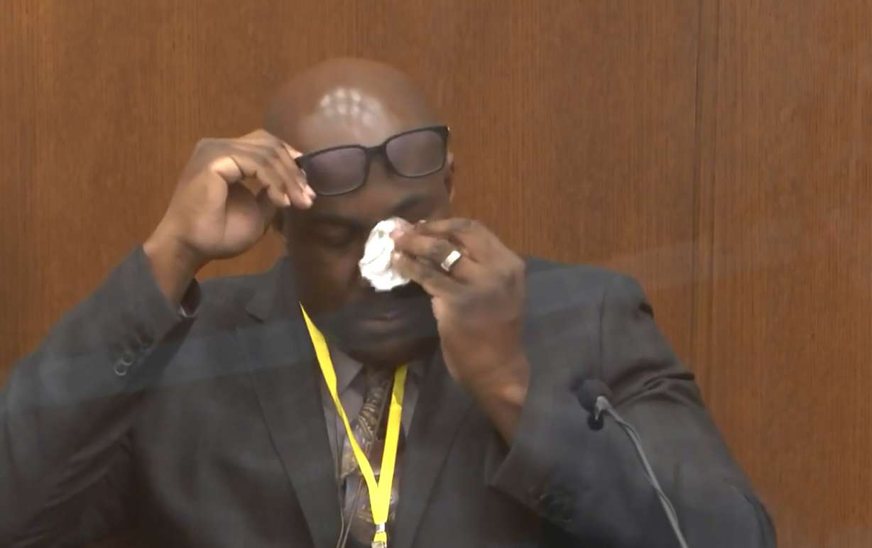In this image from video, Philonise Floyd, brother of George Floyd, becomes emotional as he testifies as Hennepin County Judge Peter Cahill presides over court Monday, April 12, 2021, in the trial of former Minneapolis police Officer Derek Chauvin, in the May 25, 2020, death of George Floyd at the Hennepin County Courthouse in Minneapolis, Minn.
