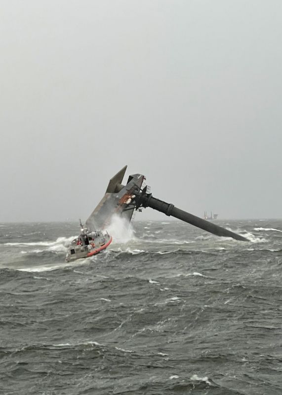 A Coast Guard Station Grand Isle 45-foot Respone Boat-Medium crew heads toward a commercial lift vessel after it capsized in a storm, in the water 8 miles south of Grand Isle, Louisiana, U.S., April 13, 2021. U.S. Coast Guard Photo courtesy of Coast Guard Cutter Glenn Harris
