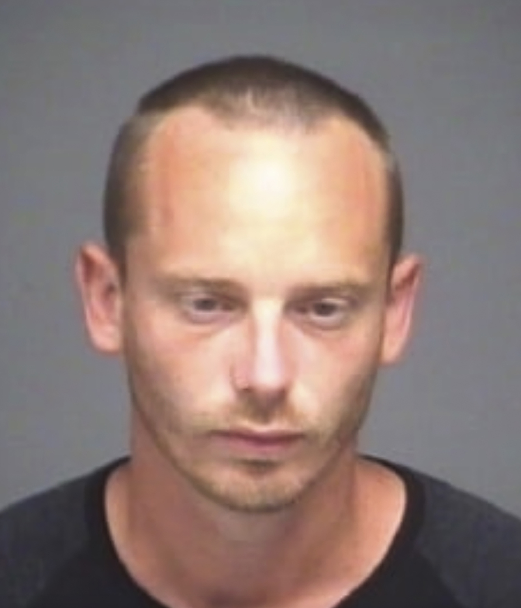 1 arrested, 1 sought in connection to Texas officer shooting