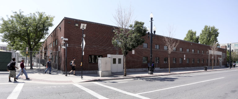 People walk in front of The Road Home in Salt Lake City on Wednesday, Aug. 8, 2018.
