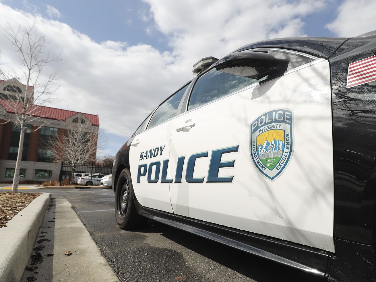 A man died and a woman was injured Friday in a shooting in Sandy, police said.