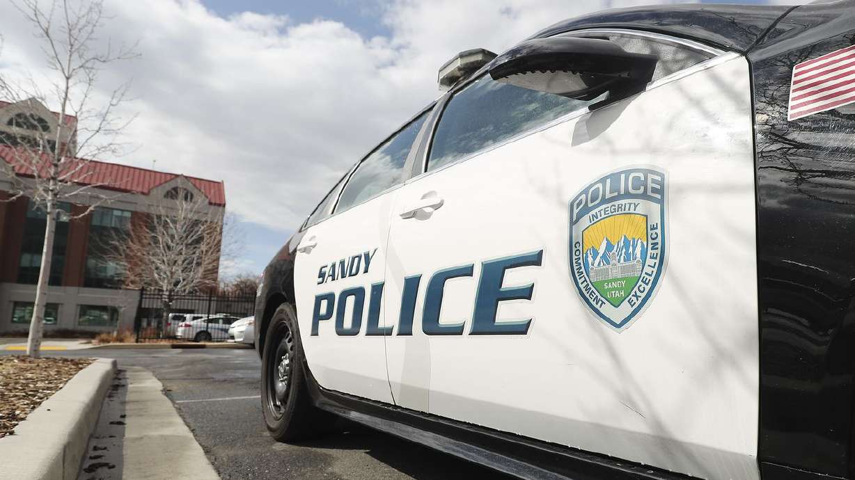 A man died and a woman was injured Friday in a shooting in Sandy, police said.