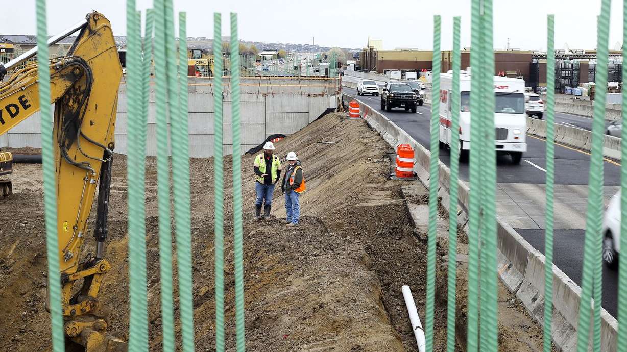 Traffic moves through the construction zone for the
Bangerter Highway interchange at 12600 South in Riverton on
Thursday, April 15, 2021. The Utah Department of Transportation
will work on 185 projects in 2021, with a value of $3.45 billion
over the life of the projects, many of which span multiple years.