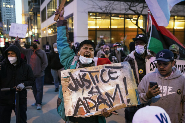 Dozens of protesters march down the Magnificent Mile after the city of Chicago released videos of 13-year-old Adam Toledo being fatally shot by a Chicago police officer, Thursday evening, April 15, 2021, in Chicago. Toledo was shot to death by an officer on March 29 in an alley west of the 2300 block of South Sawyer Avenue in Little Village on the Southwest Side.