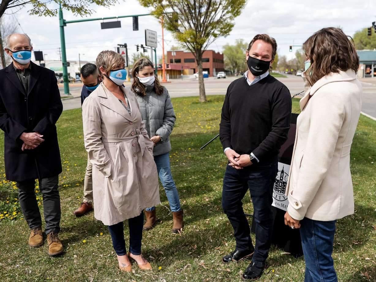 Salt Lake City Councilman Andrew Johnston chats with Mayor Erin Mendenhall and other City Council members after it was announced he has been hired as the city’s director of homelessness policy and outreach during a press conference at the corner of 800 West and North Temple in Salt Lake City on Friday, April 16, 2021.