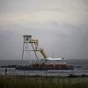 Divers back in Gulf; search resumes for capsized boat's crew