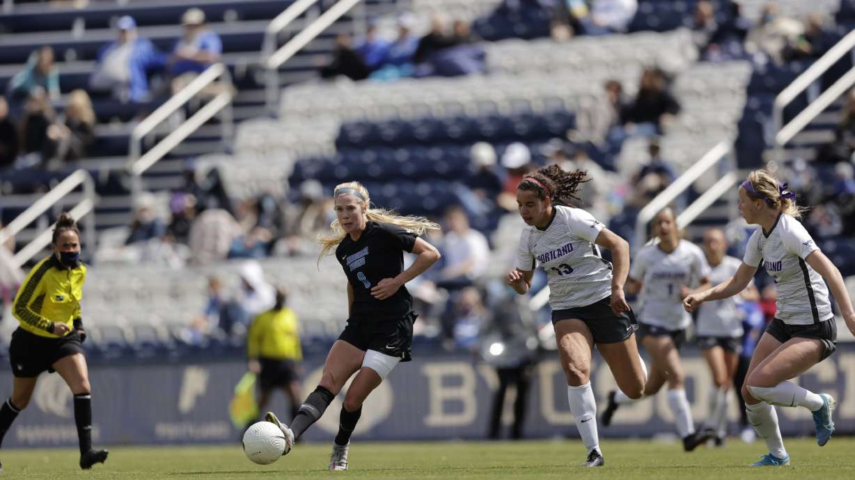 BYU's Mikayla Colohan passes the ball against Portland during the Cougars' regular-season finale, Saturday, April 17, 2021 in Provo.