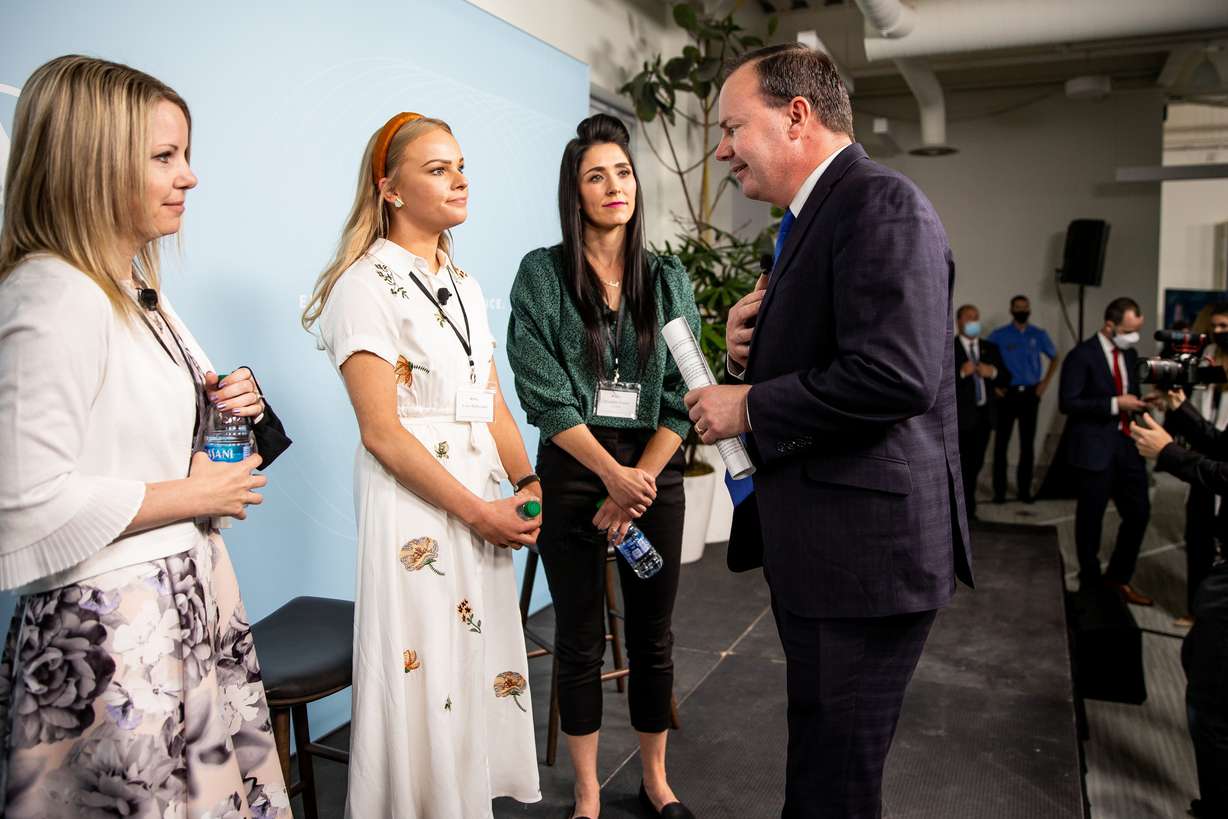 Sen. Mike Lee, R-Utah, greets human trafficking survivors Julie Whitehead, Coco Berthmann and Elizabeth Frazier at the Human Trafficking Policy and Education Summit at the Malouf Foundation in Logan on Saturday, April 17, 2021.
