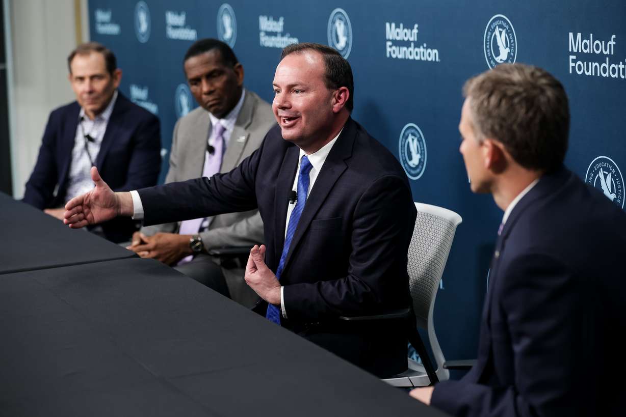 Sen. Mike Lee, R-Utah, talks to journalists at the Human Trafficking Policy and Education Summit at the Malouf Foundation in Logan on Saturday, April 17, 2021. With Lee are Reps. John Curtis, Burgess Owens and Blake Moore, all R-Utah.