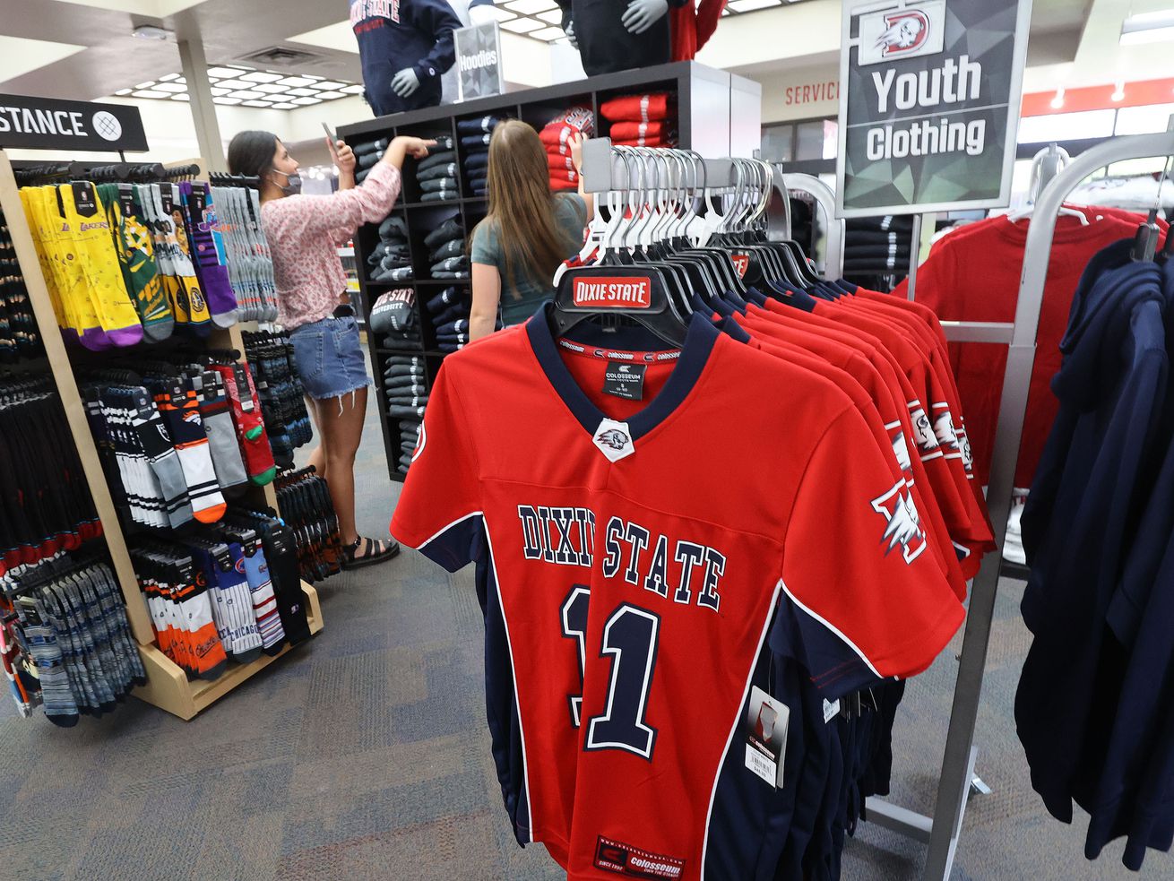 People shop for clothing at Dixie State University in
St. George on Friday, April 9, 2021. The university has proposed
creating a University College to help students who are not ready
for college-level studies, including offering advising and
tutoring.