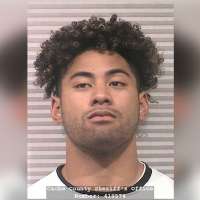Utah State football player arrested in connection with female student assault in campus dorm