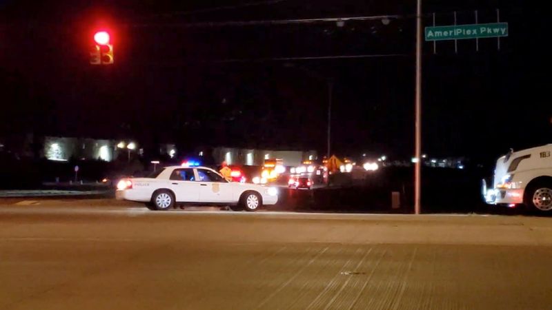 FILE PHOTO: Police are seen in a street following a shooting incident at a FedEx facility in Indianapolis, Indiana, U.S. April 16, 2021, in this still image taken from a video. Kevin Powell/Indy First Alert/via REUTERS