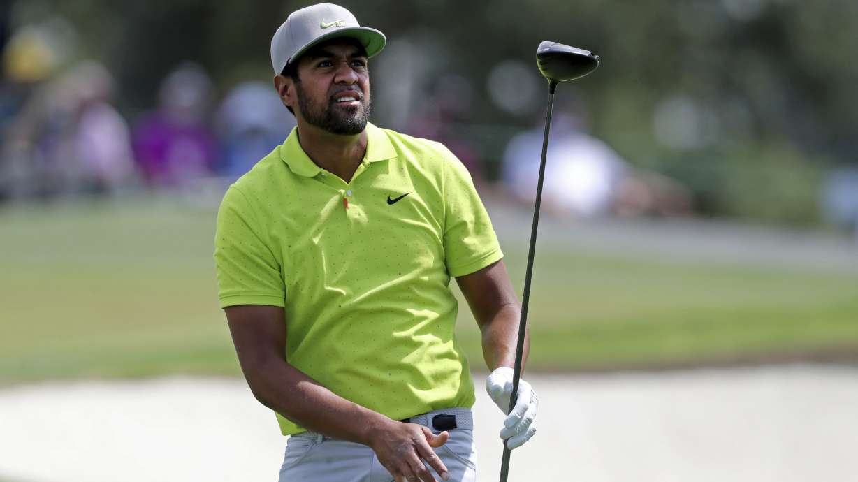 Tony Finau tees off on the third hole during the final round of the Masters golf tournament at Augusta National, Sunday, April 11, 2021, in Augusta, Ga.