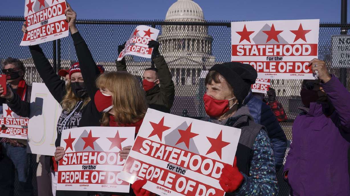 Advocates for statehood for the District of Columbia
rally near the Capitol prior to a House of Representatives hearing
on creating a fifty-first state, in Washington, Monday, March 22,
2021.