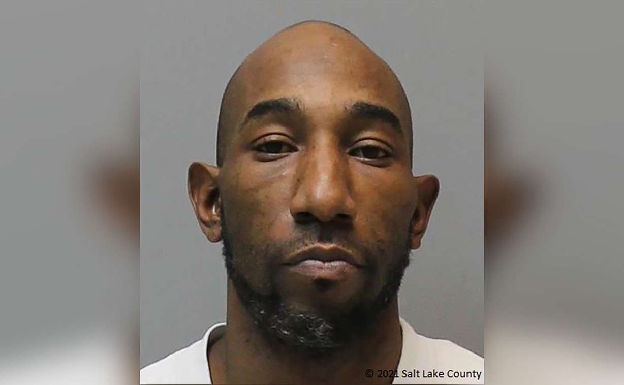 Patrick Koaneil Brown, 42, was booked into the Salt Lake County Jail for investigation of murder, three counts of aggravated assault, three counts of shooting in the direction of a person and being a restricted person in possession of a firearm.