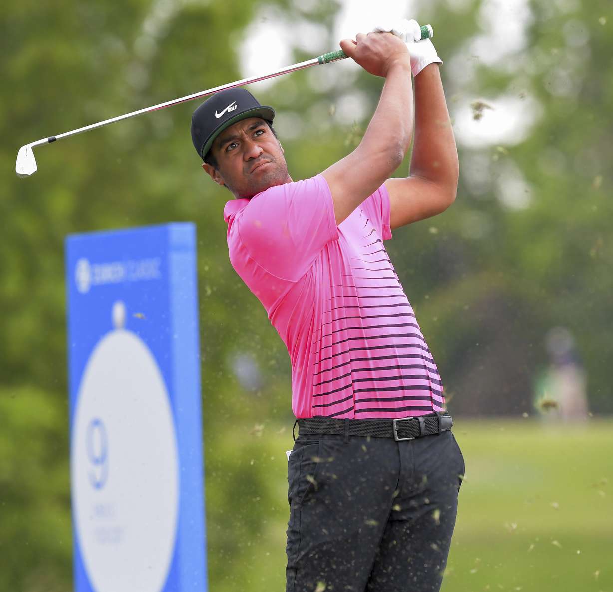 Tony Finau watches his his tee shot on the ninth hole during the second round of the Zurich Classic golf tournament at TPC Louisiana in Avondale, La., Friday, April 23, 2021.