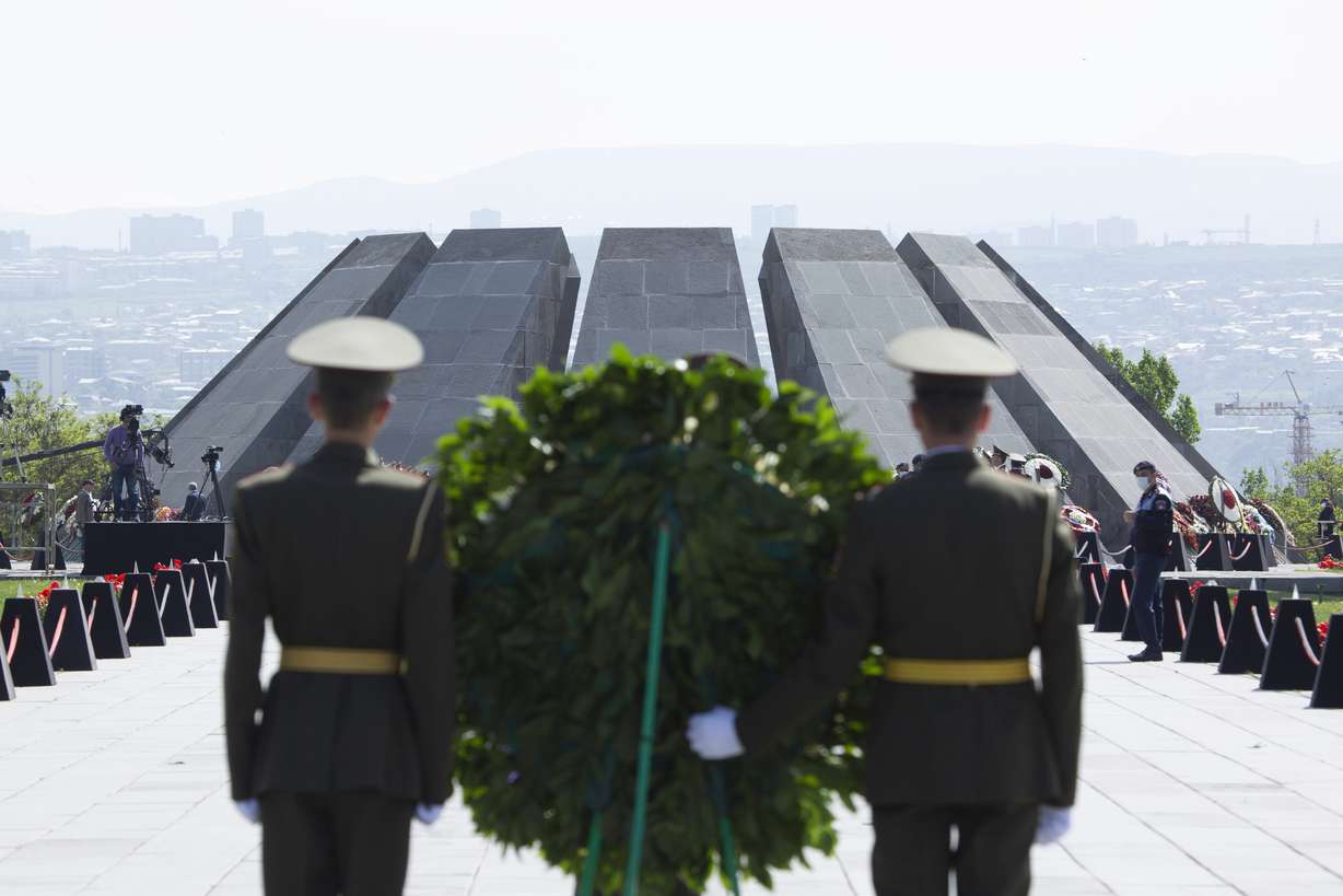 Armenian honor guards attend a memorial service at the monument to the victims of mass killings by Ottoman Turks, to commemorate the 106th anniversary of the massacre, in Yerevan, Armenia, Saturday, April 24, 2021.