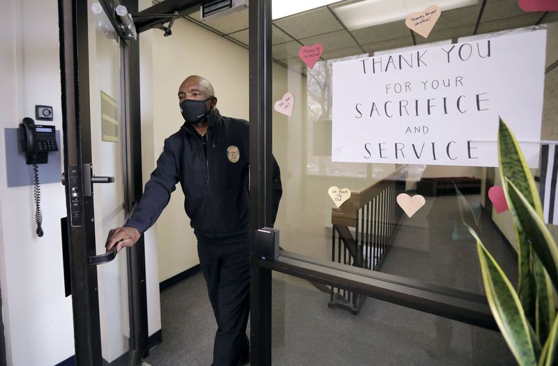 Murray Assistant Police Chief Joe Tarver exits the police station to go outside for a portrait in Murray on Tuesday, April 13, 2021. Tarver is leaving the department to become chief of investigations for the Salt Lake County District Attorney’s Office.