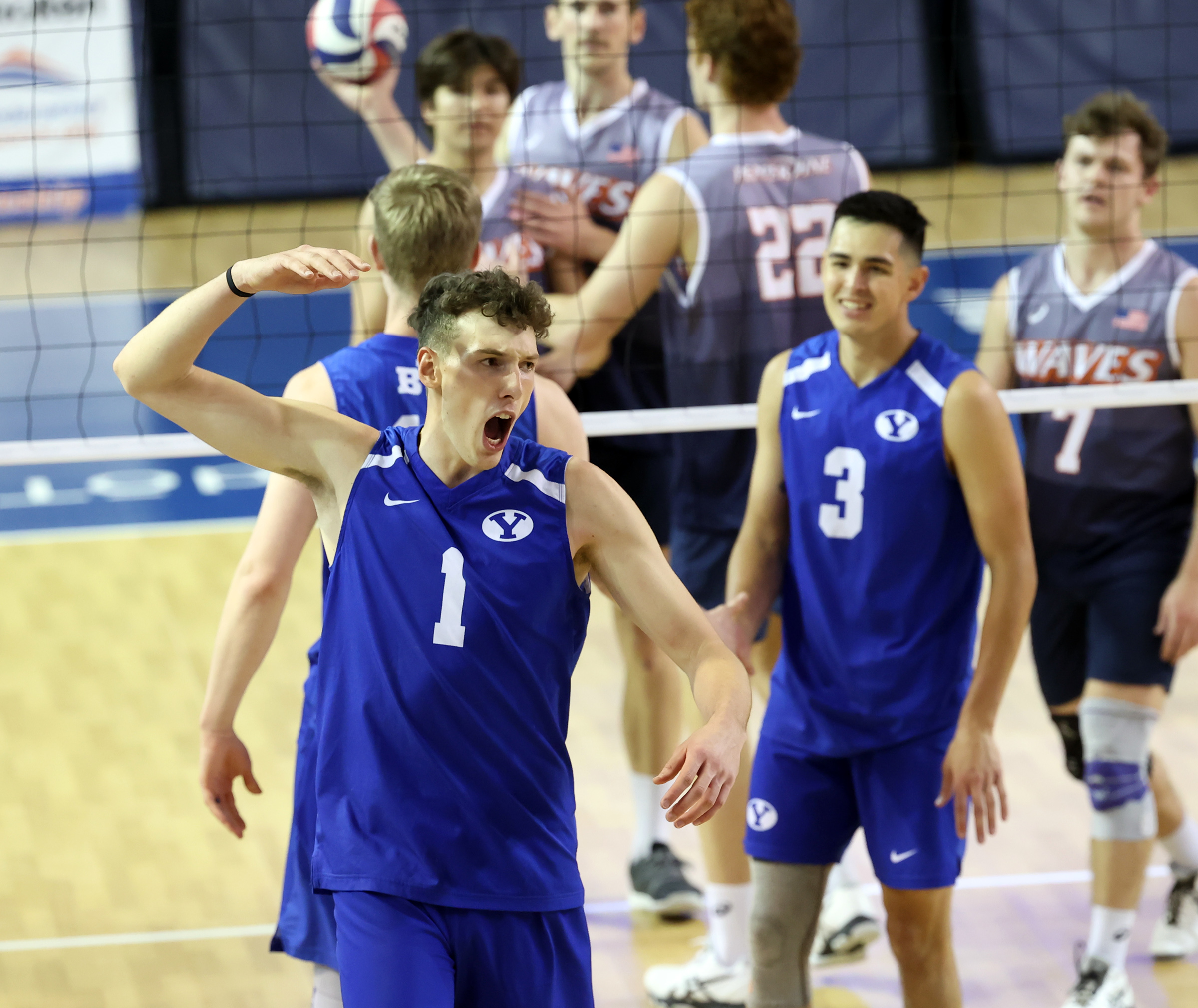 BYU’s Davide Gardini turns and celebrates as BYU defeats Pepperdine in the finals of the Mountain Pacific Sports Federation Championship, at the Smith Field House in Provo on Saturday, April 24, 2021. BYU won in straight sets.