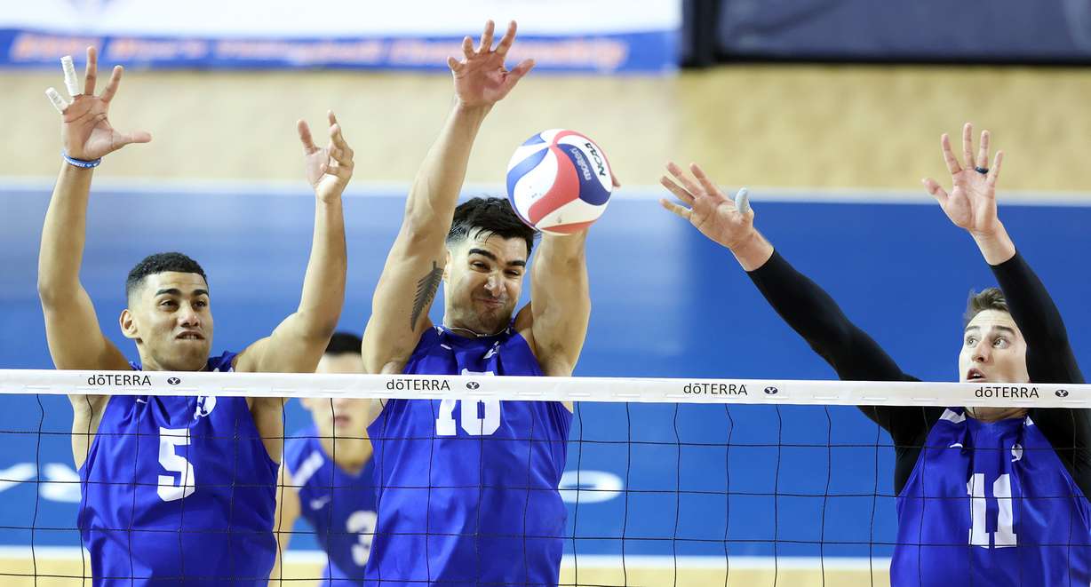 BYU’s Gabi Garcia Fernandez, Felipe de Brito Ferreira and Zach Eschenberg go up for a block as BYU and Pepperdine play in the finals of the Mountain Pacific Sports Federation Championship, at the Smith Field House in Provo on Saturday, April 24, 2021. BYU won in straight sets.