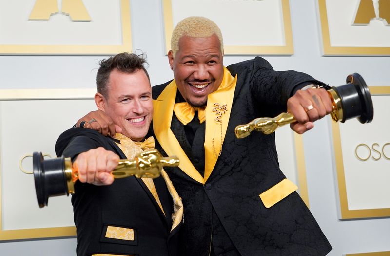 Martin Desmond Roe and Travon Free pose with award for Best Live Action Short Film for "Two Distant Strangers" in the press room at the Oscars.