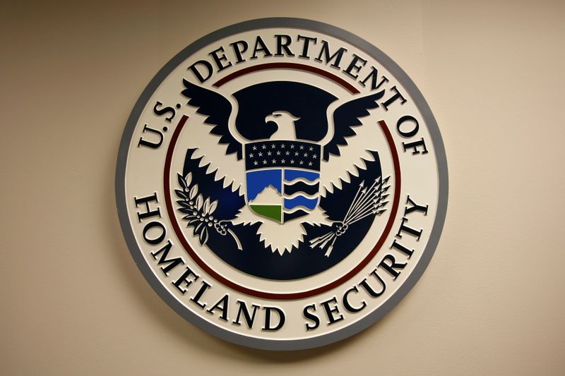 FILE PHOTO: U.S. Department of Homeland Security emblem is pictured at the National Cybersecurity & Communications Integration Center (NCCIC) located just outside Washington in Arlington, Virginia September 24, 2010.  REUTERS/Hyungwon Kang/File Photo