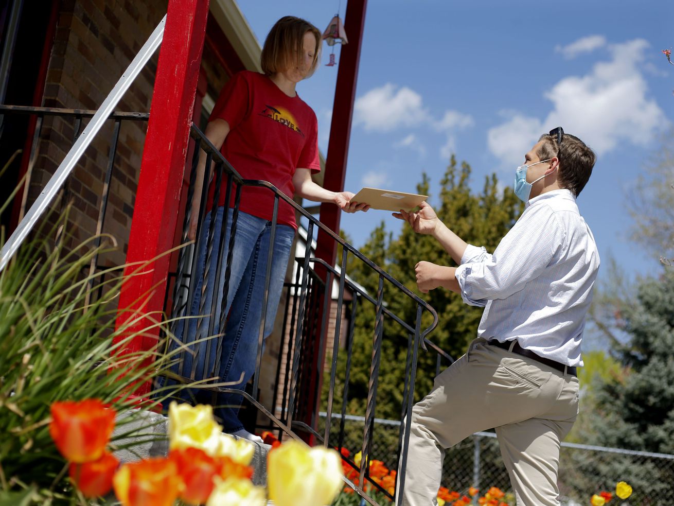 Nola Otterstrom signs a ballot qualification form for
Salt Lake City Council candidate Blake Perez in Salt Lake City on
Friday, April 23, 2021. To qualify for the ballot, council
candidates must collect at least 75 signatures from residents in
their district who are at least 18 years old.