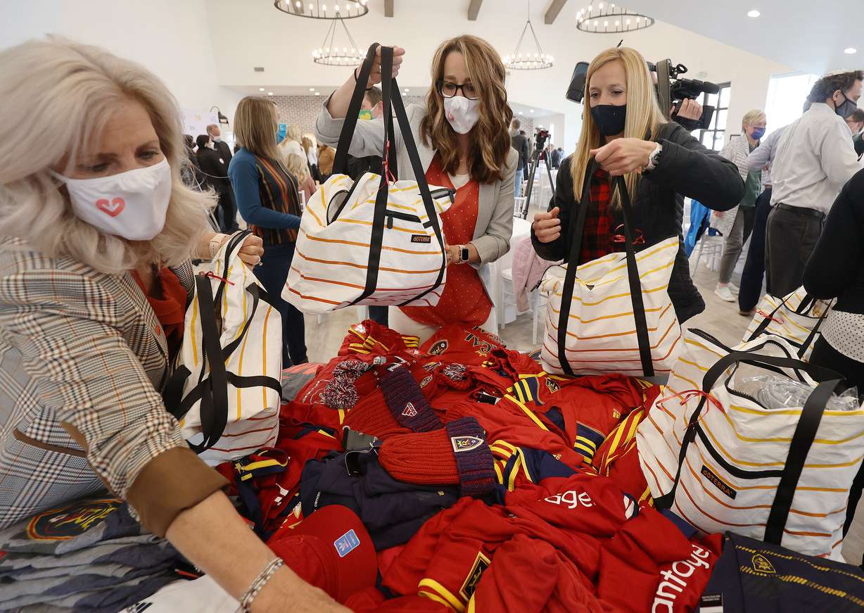 Utah first lady Abby Cox, center, along with mother-in-law Lesa Cox, left, and sister Lisle Dewey, right, join volunteers to putting together 1,500 thank-you kits for Utah's foster and kinship families at Bridle Up Hope in Alpine on Tuesday, April 27, 2021. During the event, Abby Cox announced her new statewide initiative called Show Up, a multifaceted endeavor aimed at promoting empathy in the state through service.