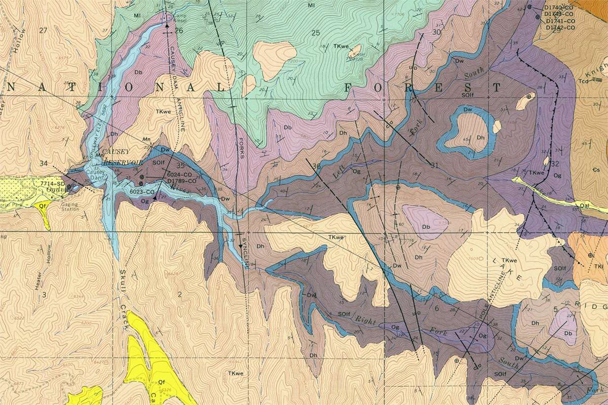 The area surrounding Causey Reservoir is represented in this 1969 U.S. Geological Survey map titled Geologic Map of the Causey Dam Quadrangle, Weber County, Utah. Elevations of terrain are marked with contour lines, while exposed rock strata are coded by color.