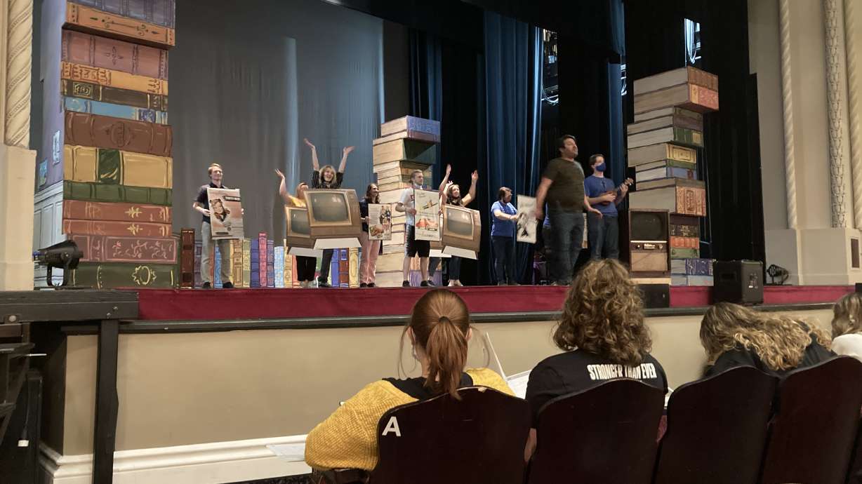 The cast of Cache Theater Company's production of "Matilda the Musical" practices for their upcoming show. The production was canceled in the spring of 2020 due to COVID-19 pandemic restrictions, but the group has worked hard to bring it to the stage one year later.