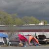 Property owner calls on city to fix issues at nearby homeless camp