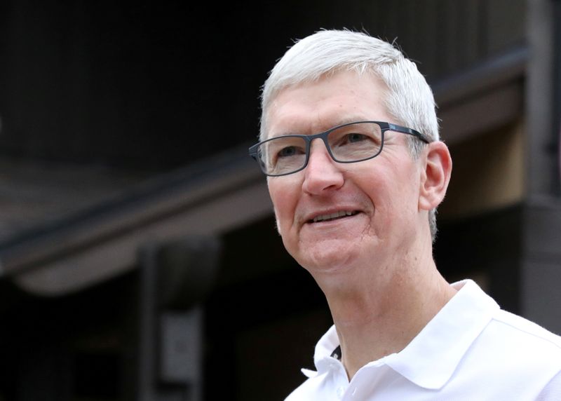 FILE PHOTO: Tim Cook, CEO of Apple, attends the annual Allen and Co. Sun Valley media conference in Sun Valley, Idaho, U.S., July 10, 2019. REUTERS/Brendan McDermid