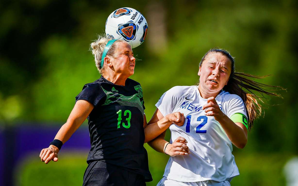 Utah Valley's Amber Tripp heads the ball during the first round of the NCAA women's soccer tournament against Memphis, Wednesday, April 28, 2021 in Greenville, N.C.