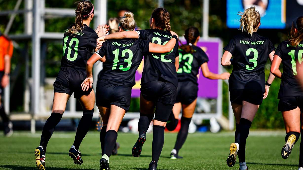 Utah Valley celebrates Sadie Brockbank's game-winning goal during the first round of the NCAA women's soccer tournament against Memphis, Wednesday, April 28, 2021 in Greenville, N.C.