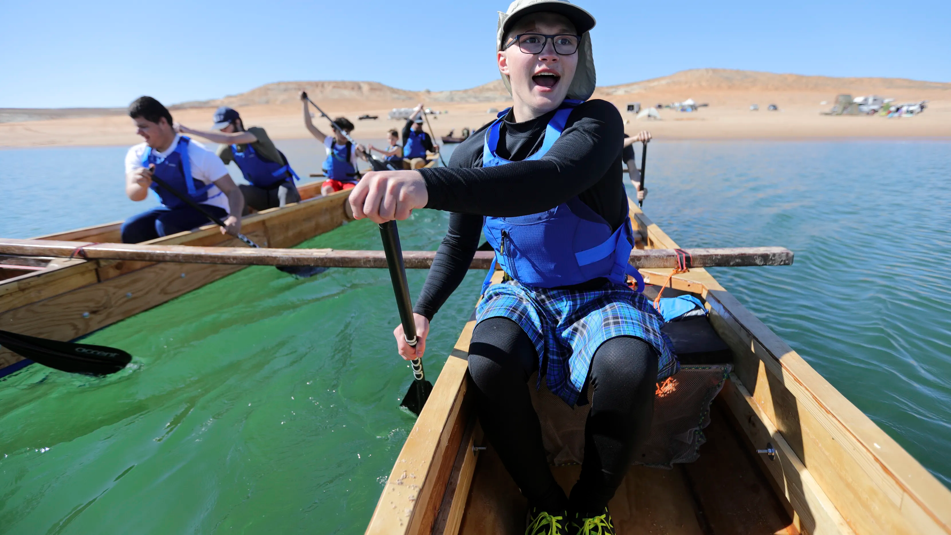 Landon Pearce, a visually impaired 10th grader at the Utah Schools for the Deaf and the Blind, paddles with his team on Lake Powell on Saturday, March 27, 2021. They are training for the SEVENTY48, a 70-mile-human-powered boat race from Tacoma to Port Townsend, Wash.