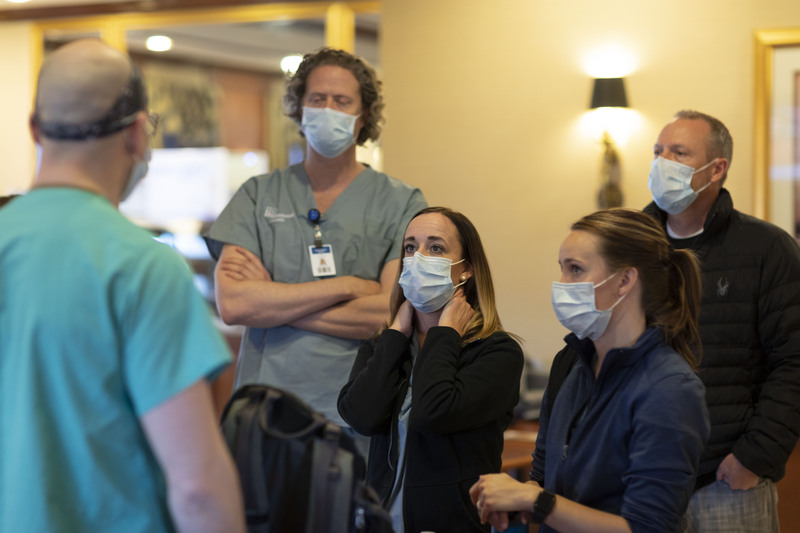This undated photo shows medical professionals from Intermountain Healthcare conversing during the early COVID-19 pandemic.
