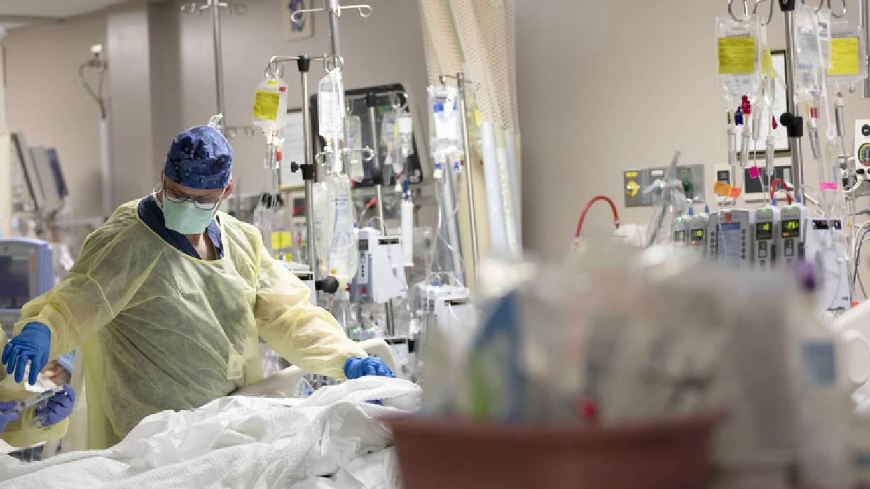This undated photo shows Intermountain Healthcare staffers working in a hospital during the early COVID-19 pandemic. The Utah Department of Health announced Thursday a Utah girl between 15-17 died from COVID-19.