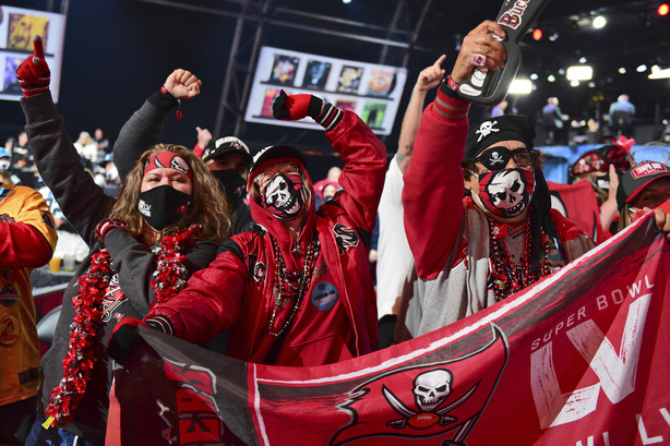 Tampa Bay Buccaneers fans cheer after Tampa Bay picked Kyle Trask, from Florida, in the second round of the NFL football draft Friday, April 30, 2021, in Cleveland. (Photo: David Dermer, Associated Press)