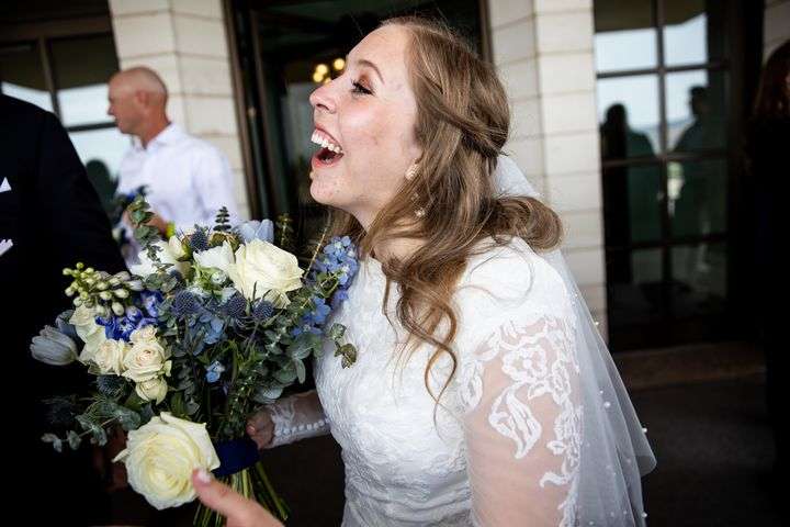Breanna Hedelius Coberly reacts to the news about the renovations of the Manti Utah Temple and the building of a temple in Ephraim, which was announced in a meeting while she was being married and sealed in the Manti Utah Temple in Manti on Saturday, May 1, 2021.