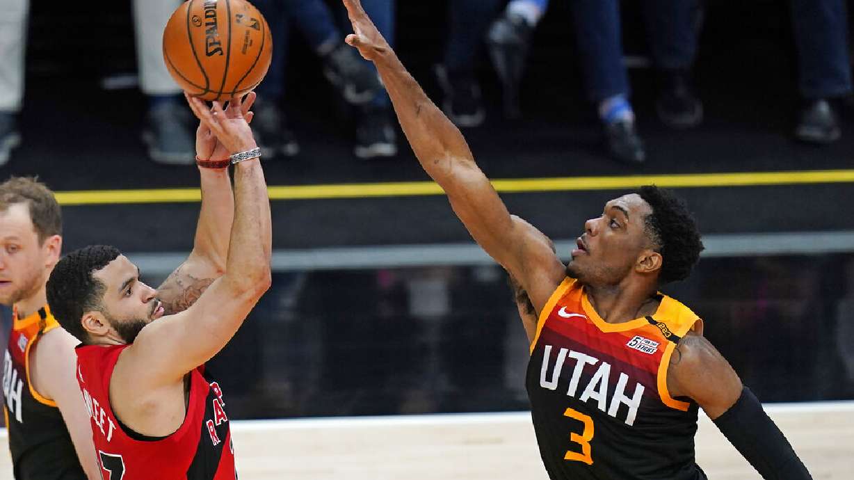 Toronto Raptors guard Fred VanVleet (23) shoots as Utah Jazz guard Trent Forrest (3) defends during the second half of an NBA basketball game Saturday, May 1, 2021, in Salt Lake City. (AP Photo/Rick Bowmer)