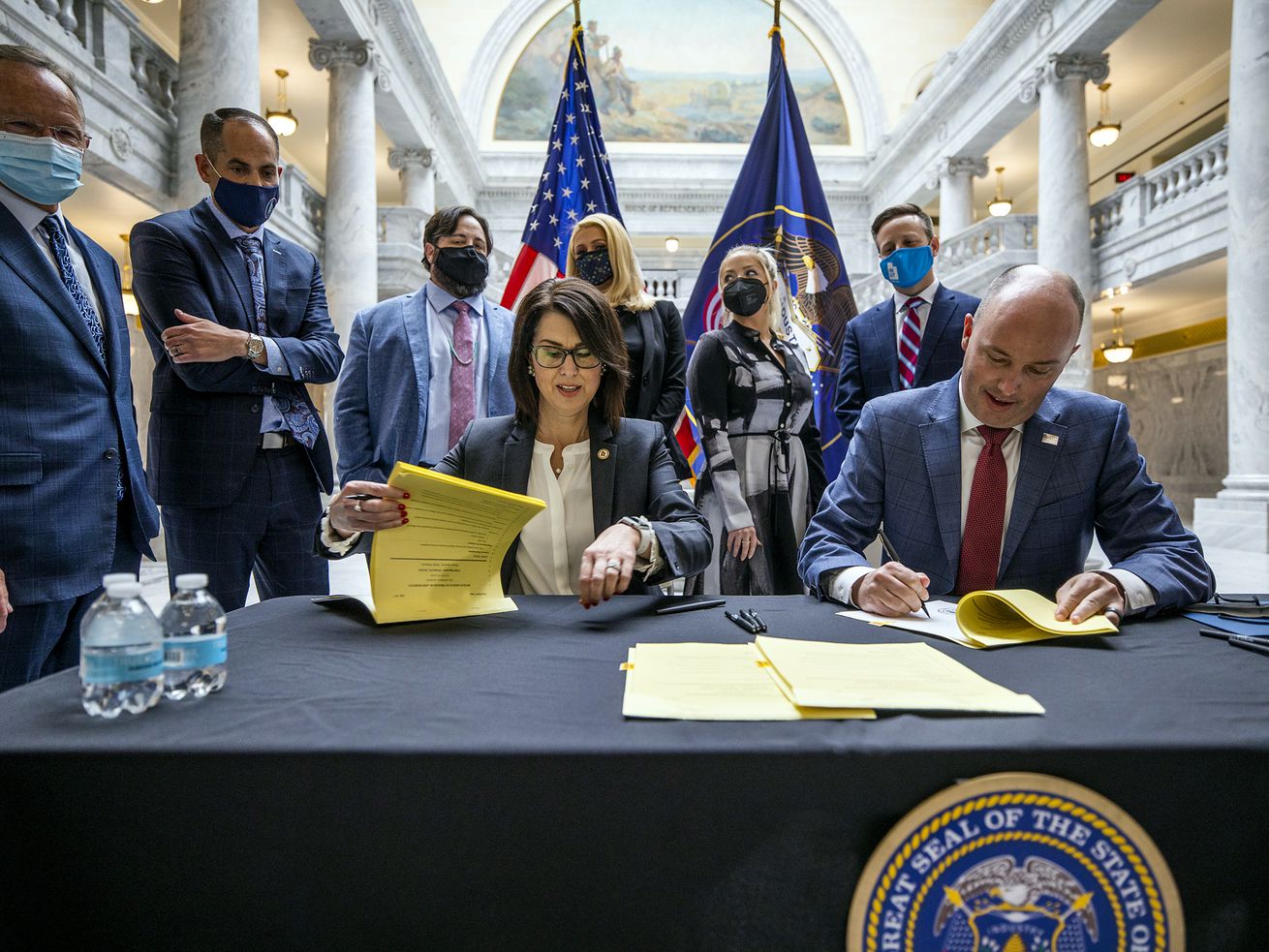 Lt. Gov. Deidre Henderson, center left, and Gov.
Spencer J. Cox, center right, sign SB127 during a ceremonial
signing with Sen. Mike McKell, bill sponsor, Rep. Brady Brammer,
floor sponsor, and Paris Hilton in the rotunda of the Capitol in
Salt Lake City on Tuesday, April 6, 2021. SB127 increases
transparency in Utah’s congregate care programs.