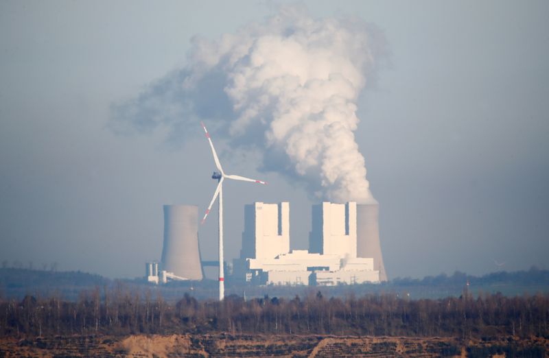 FILE PHOTO: Steam rises from Neurath lignite power plant, in Grevenbroich, Germany, January 16, 2020. REUTERS/Wolfgang Rattay