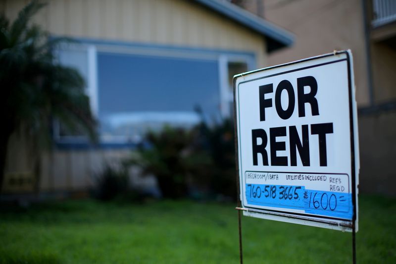 FILE PHOTO: A "For Rent" sign is posted outside a residential home in Carlsbad, California, U.S. on January 18, 2017.  REUTERS/Mike Blake