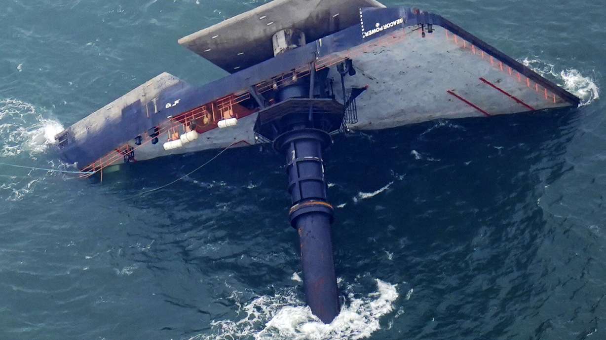 Salvage crews removing fuel from capsized lift boat