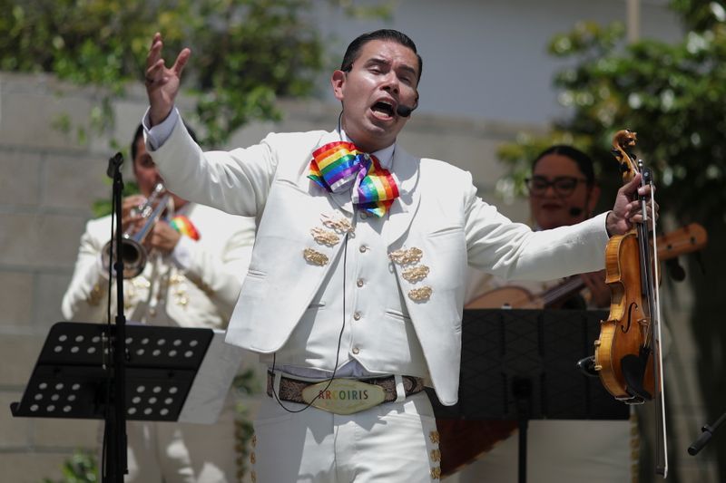 Carlos Samaniego, member of the mariachi band "Mariachi Arcoiris" performs during a streamed concert on Cinco de Mayo from a backyard in Whittier, California, U.S., May 5, 2021. REUTERS/Lucy Nicholson