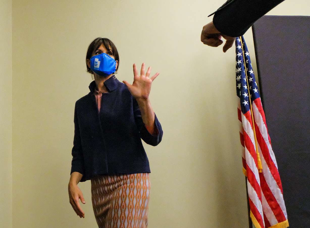State epidemiologist Dr. Angela Dunn waves goodbye to friends and colleagues after a weekly briefing on COVID-19 at the Capitol in Salt Lake City on Thursday, May 6, 2021. Dunn is leaving her statewide post to lead the Salt Lake Countyâ??s Health Department.
