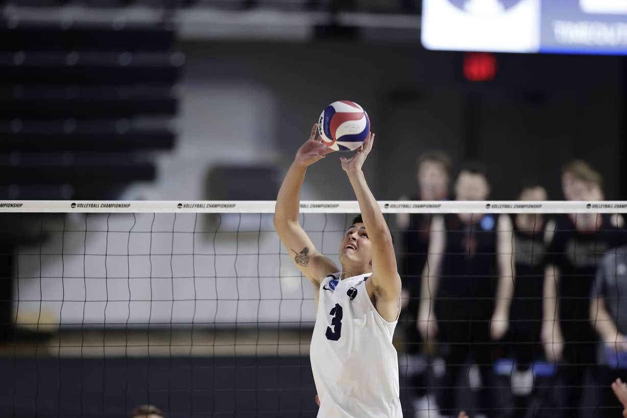 BYU setter Wil Stanley sets a pass for his teammates during the Cougars' NCAA Tournament semifinal against Lewis, Thursday, May 6, 2021 in Columbus, Ohio. BYU advanced to the title match with a 3-1 win over the Flyers.