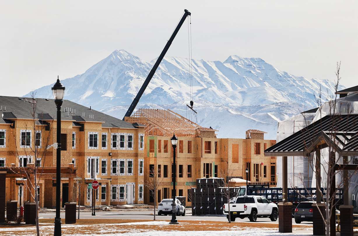 New apartments and town houses under construction in Herriman are pictured on Monday, Feb. 22, 2021.