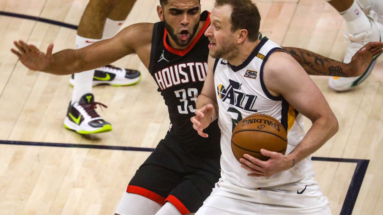 Utah Jazz guard Joe Ingles (2) moves around Houston Rockets forward Anthony Lamb (33) as the Utah Jazz and the Houston Rockets play an NBA basketball game at Vivint Arena in Salt Lake City on Saturday, May 8, 2021.
