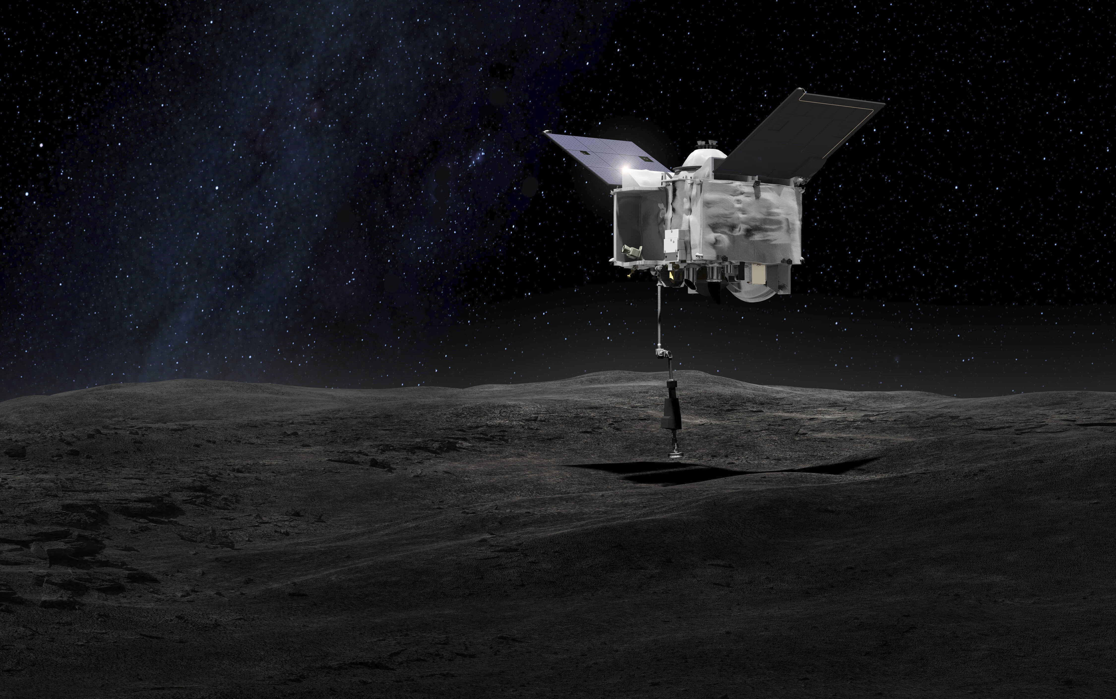 FILE - This artist's rendering made available by NASA on Tuesday, Sept. 6, 2016 shows the Origins Spectral Interpretation Resource Identification Security - Regolith Explorer (OSIRIS-REx) spacecraft contacting the asteroid Bennu with the Touch-And-Go Sample Arm Mechanism. (NASA/Goddard Space Flight Center via AP) [May-10-2021]